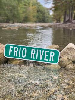 Road sign that says Frio River